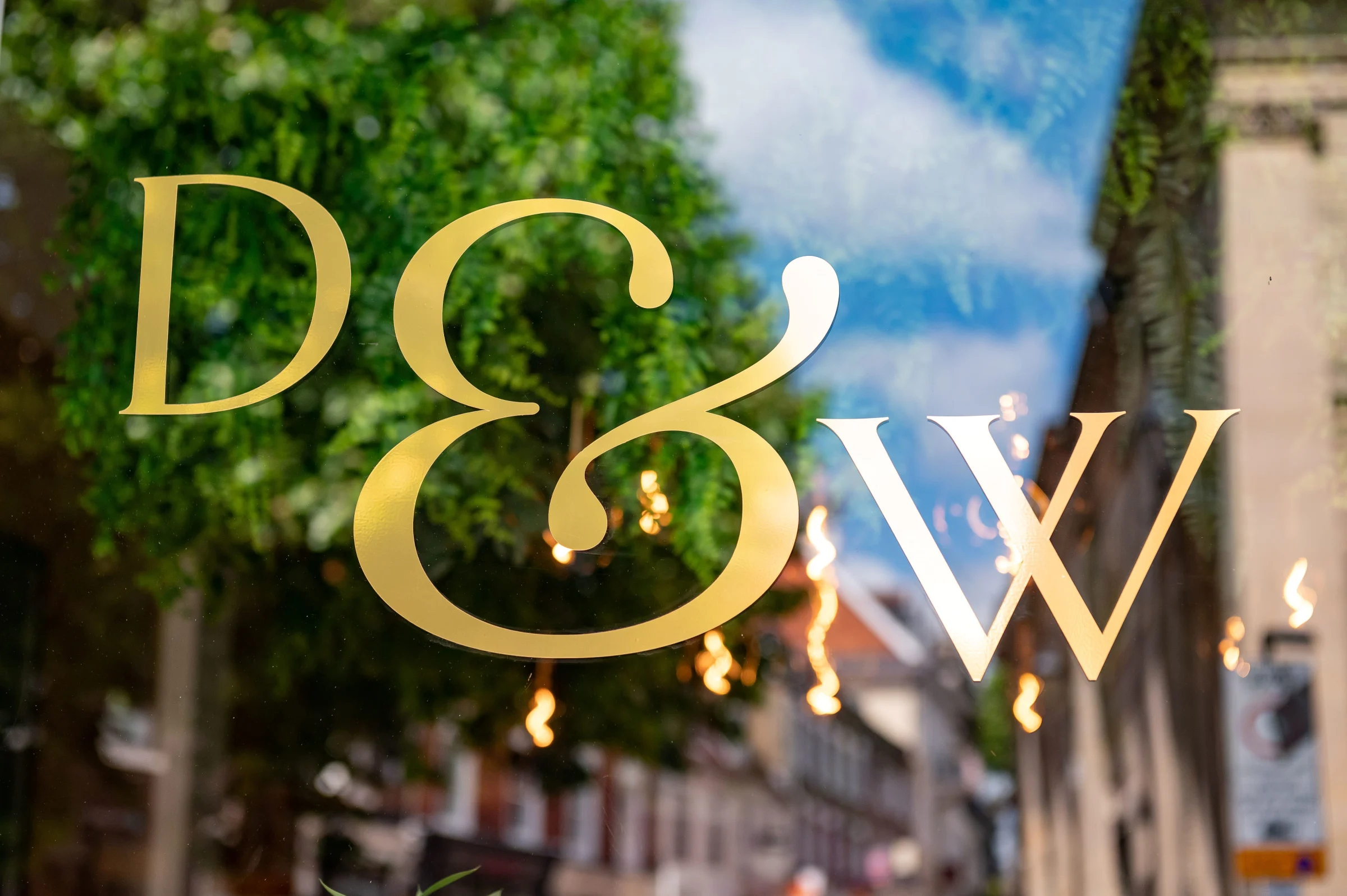 The gold D&W monogram on the window overlooking Abbeygate Street